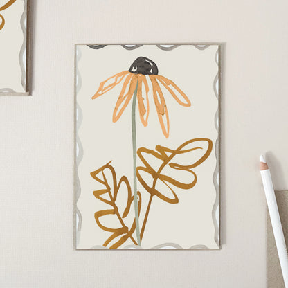 A greeting card featuring a large hand drawn orange daisy with brown leaves on a warm cream background.
