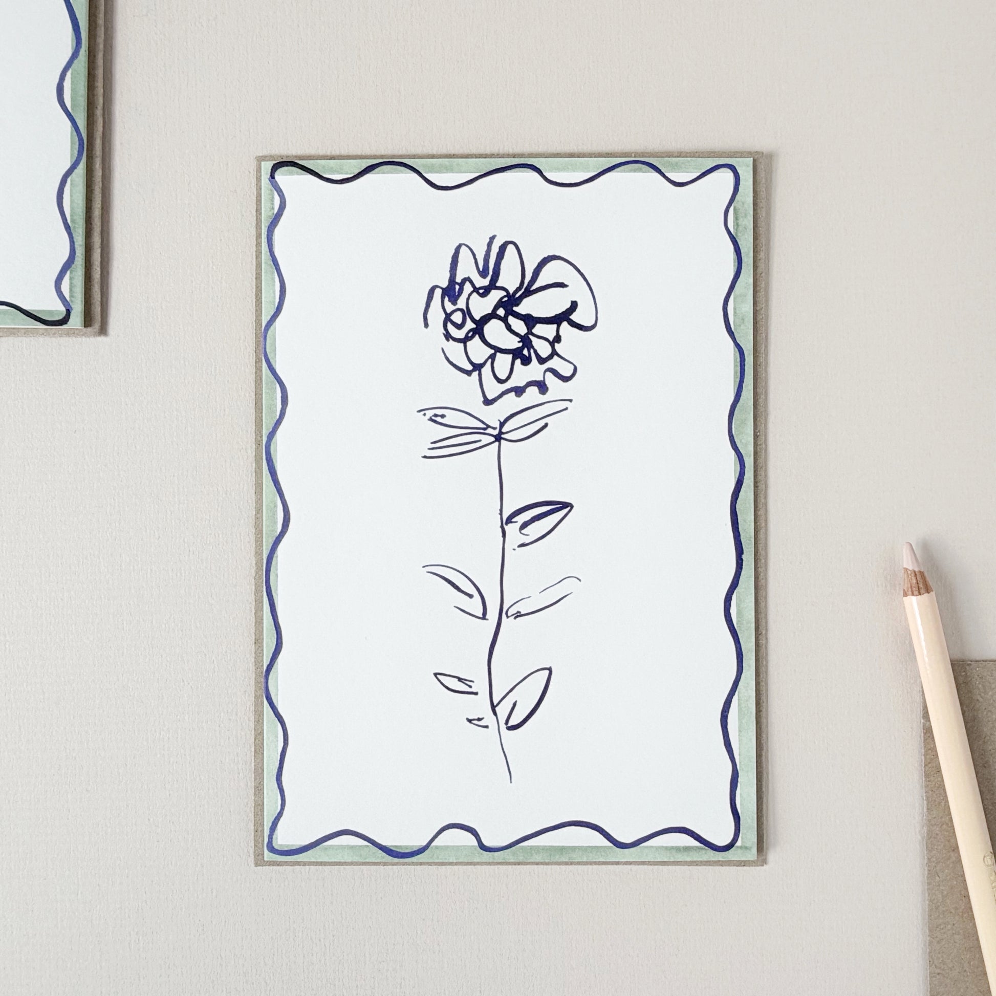 hand-designed ranunculus greeting card with blue ink floral stem illustration